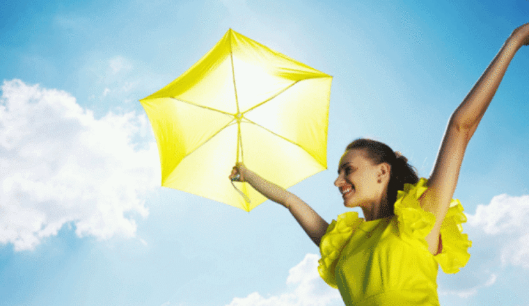 Lady_With_Umbrella_In_The_Sun