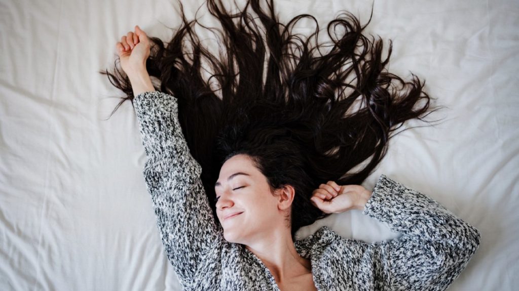 woman waking up with hair everywhere